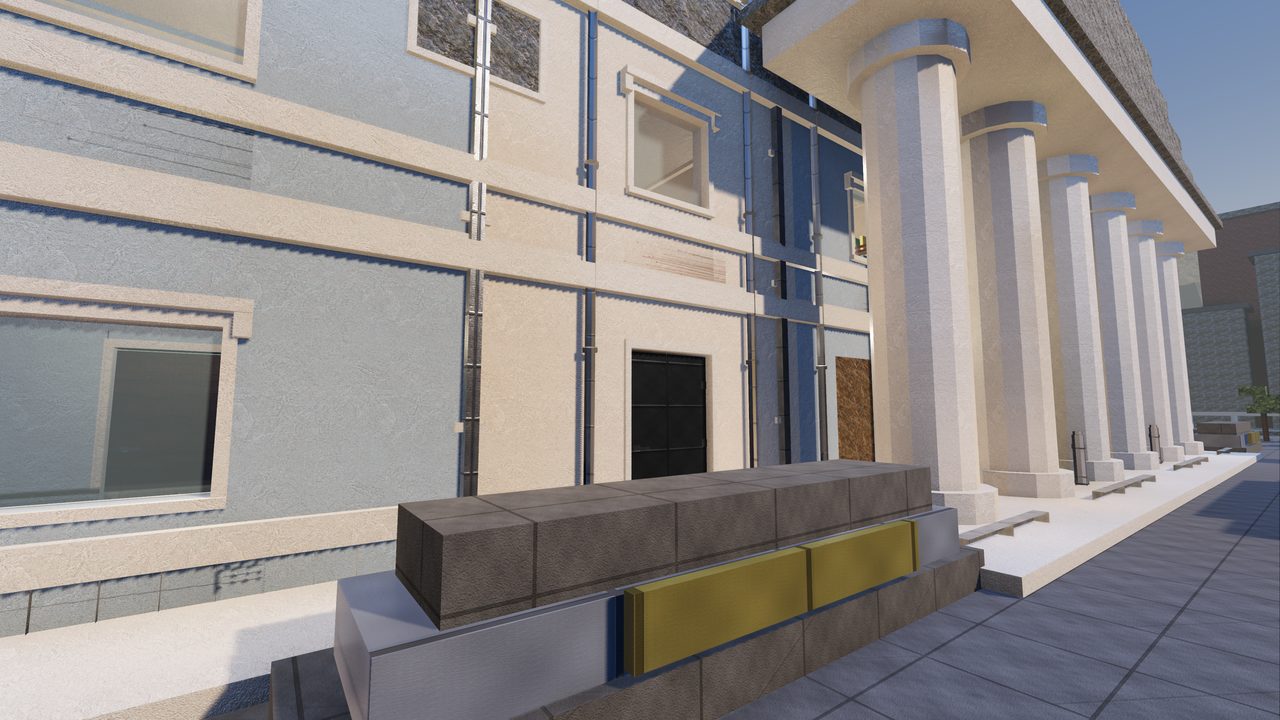 Verdigris: the colonnade along the front of the assembly building, tall pale columns carrying the portico